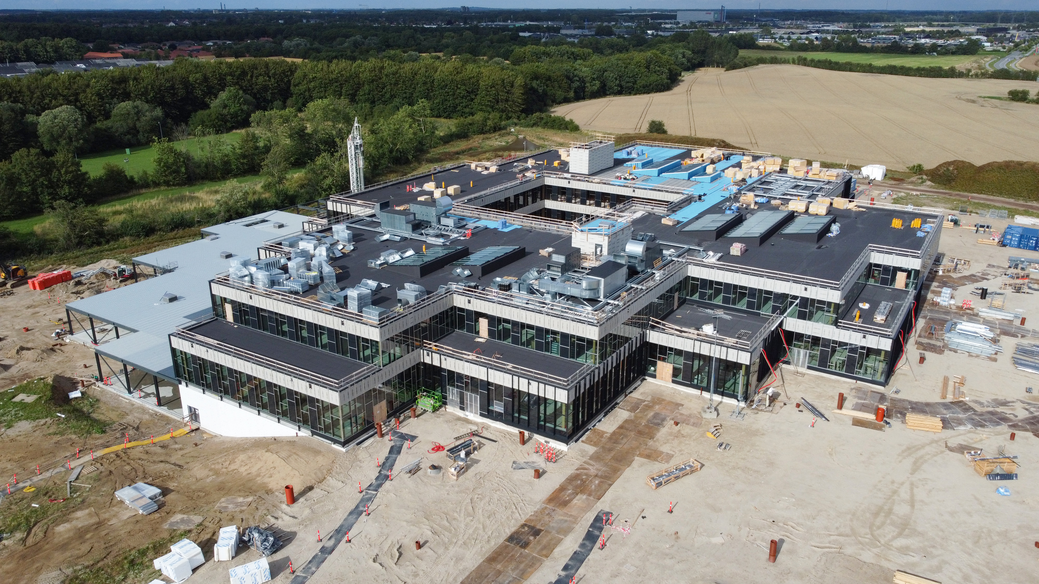 Hurtig facadelukning af råhus af træ - Foto: NCC